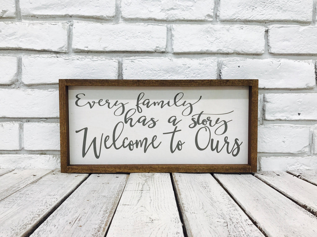 "Every Family Has a Story Welcome to Ours" Wooden Sign