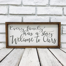 Load image into Gallery viewer, &quot;Every Family Has a Story Welcome to Ours&quot; Wooden Sign