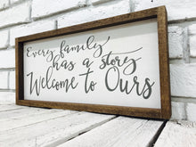 Load image into Gallery viewer, &quot;Every Family Has a Story Welcome to Ours&quot; Wooden Sign