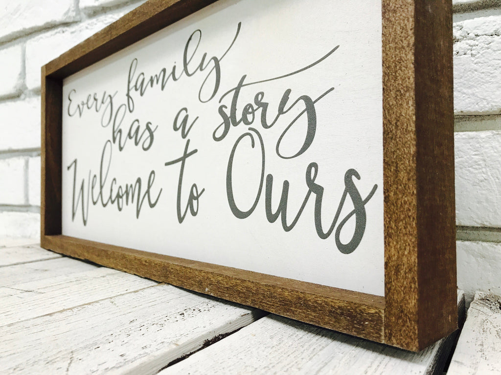 "Every Family Has a Story Welcome to Ours" Wooden Sign