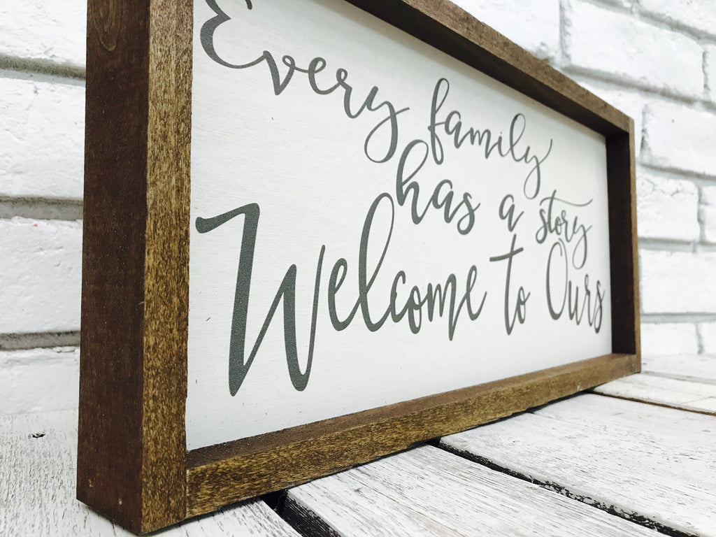 "Every Family Has a Story Welcome to Ours" Wooden Sign