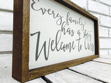 Load image into Gallery viewer, &quot;Every Family Has a Story Welcome to Ours&quot; Wooden Sign